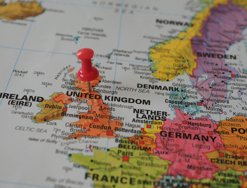 Zoomed in map showing the UK with a red pin in it and parts of Europe